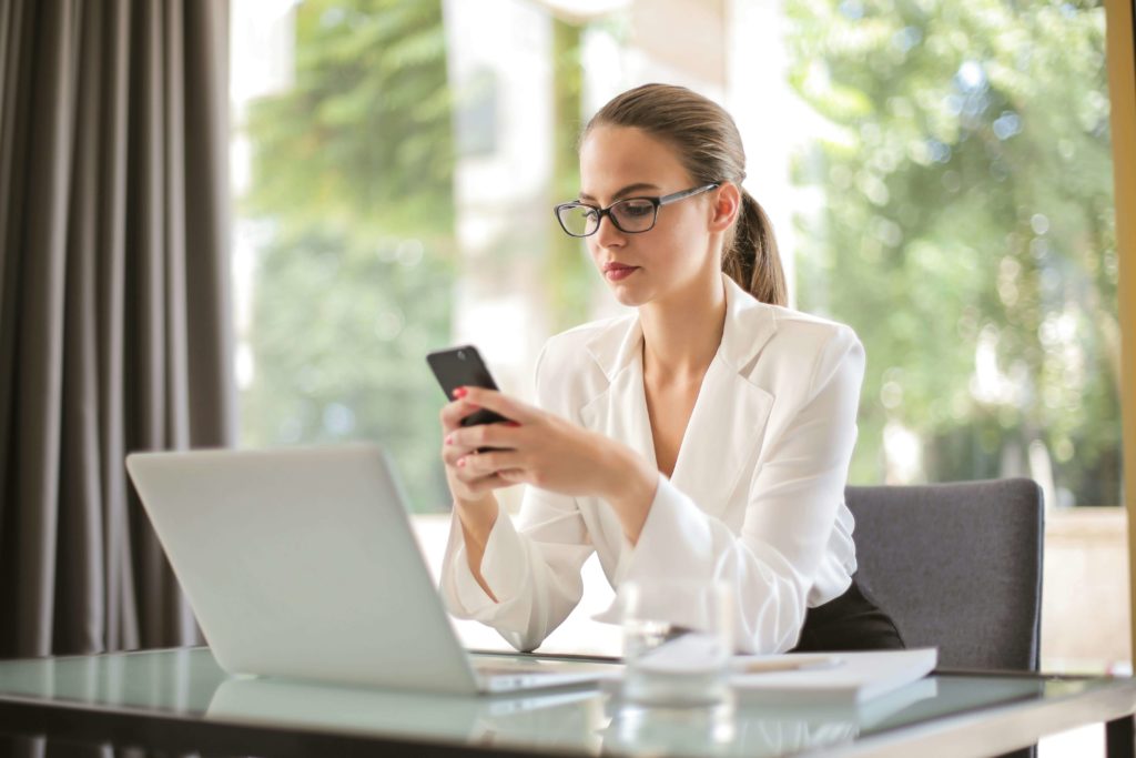 businesswoman using smartphone