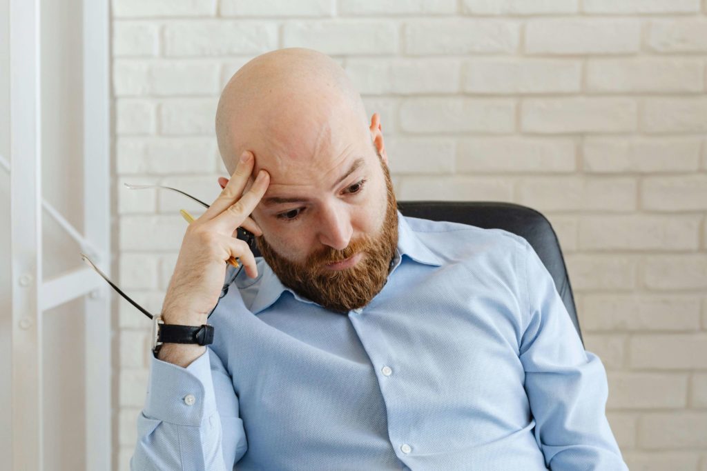 Bearded Man in Blue Long Sleeve Shirt