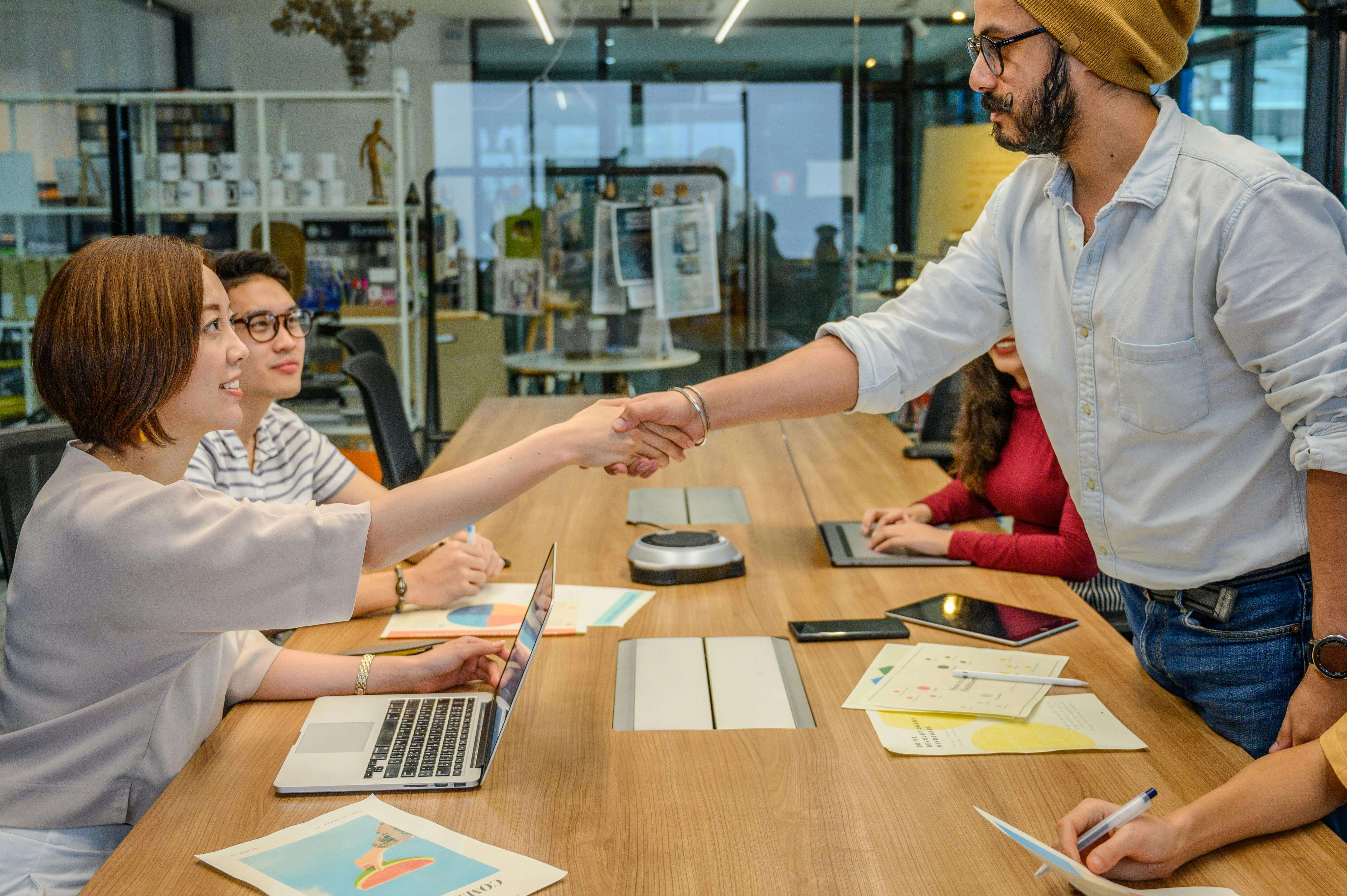 People Shaking Hands on a Business Meeting