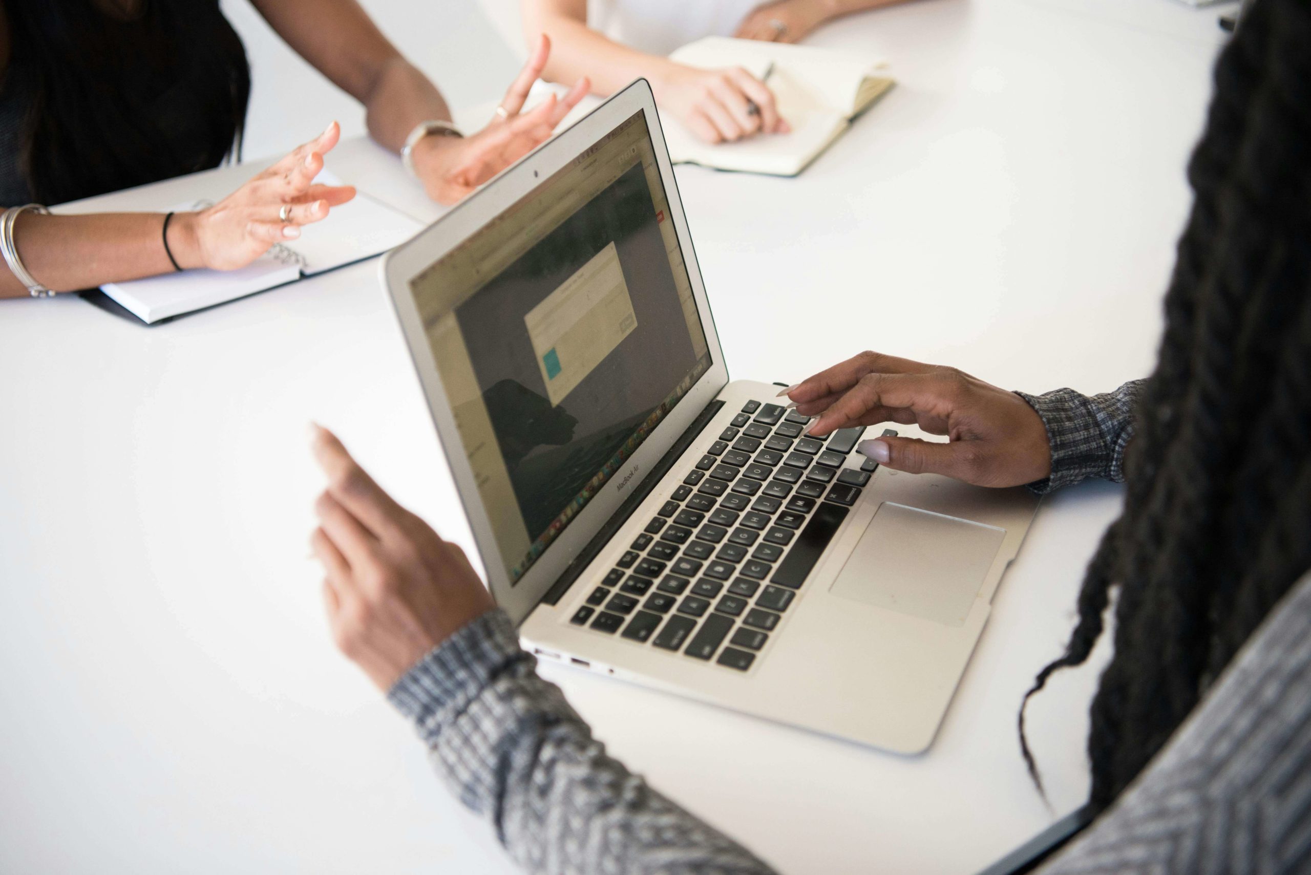 Person Using Macbook Air